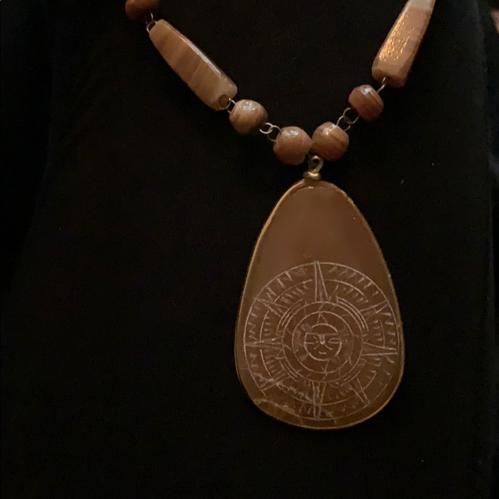 Stone necklace.